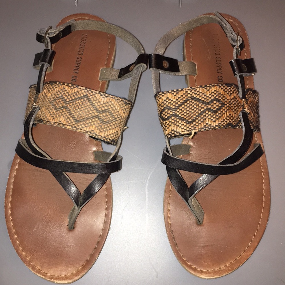 Brown and black sandals
